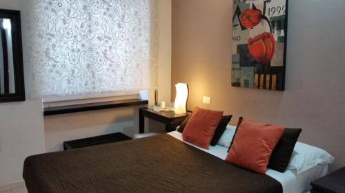 Cama o camas de una habitación en InnVatican Guest House