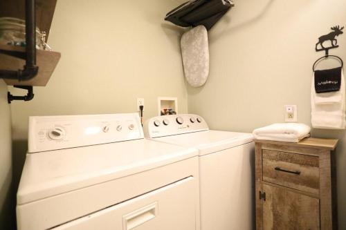 a laundry room with a washer and dryer at Bog Road 76 Campton Cozy Private Single Family Home in Campton in Campton