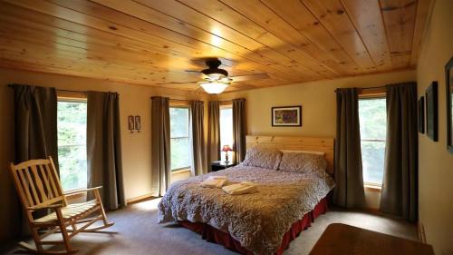 a bedroom with a bed with a wooden ceiling at Welch View 41 Thornton Private Home Close to Waterville Valley in Thornton