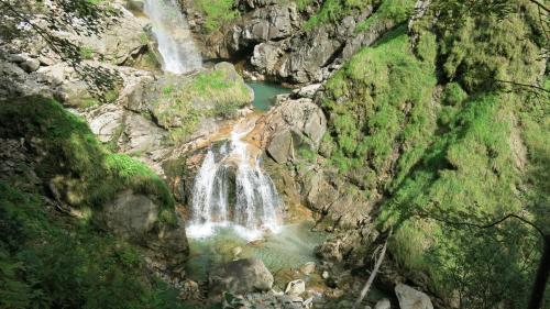 an aerial view of a waterfall in a canyon at Ferienwohnung Gästehaus Inge in Zlan