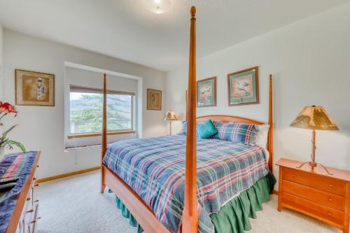 a bedroom with a bed and a window at Lookout Ridge 63 in Dillon