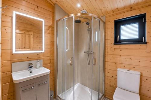 a bathroom with a shower and a sink and a toilet at 2 Bed in Nafferton oc-o31954 in Nafferton