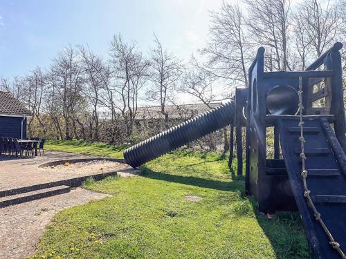 a playground equipment with a hose attached to it at 4 star holiday home in Vinderup in Vinderup