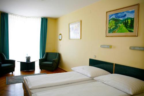 En eller flere senger på et rom på Hotel Bara Budapest