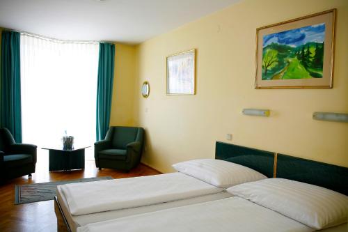 Posteľ alebo postele v izbe v ubytovaní Hotel Bara Budapest