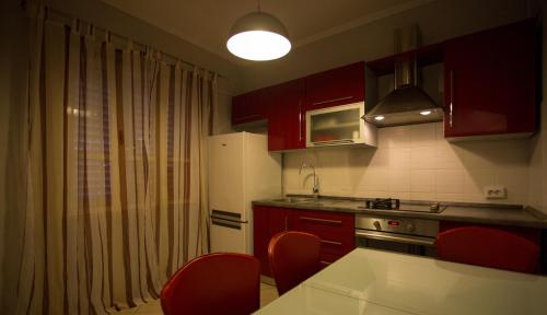 Η κουζίνα ή μικρή κουζίνα στο Apartments MT Residence