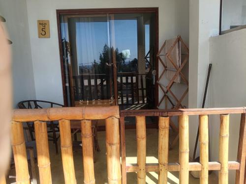 an entrance to a room with a wooden door at Loft5 matrimonial Playa Pocitas in Máncora