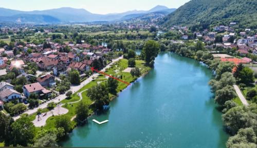 an aerial view of a town with a river at Appartement UNA La Bella 3* in Bihać