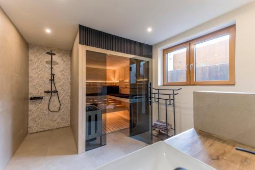 a bathroom with a shower and a sink at Auszeitquartier in Biedenkopf