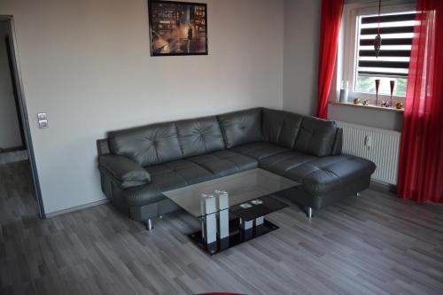 Χώρος καθιστικού στο Ferienwohnung Am Steinberg