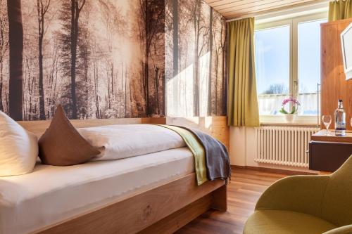 Postel nebo postele na pokoji v ubytování Hotel Waldhorn