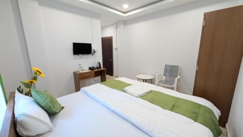 Et tv og/eller underholdning på Accomoon hotel
