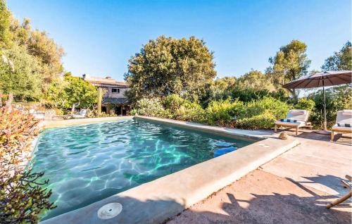 a swimming pool in the backyard of a home at Ca'n Panxeta in Felanitx