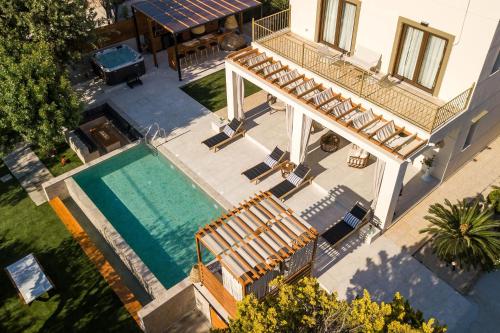 an aerial view of a house with a swimming pool at Kallisti Luxury Villa in Kallithea Rhodes