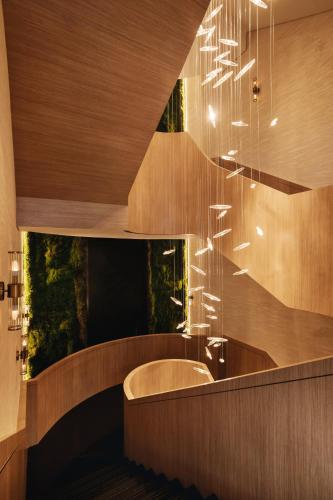 a bathroom with a sink and a staircase at Pullman Dubai Jumeirah Lakes Towers in Dubai