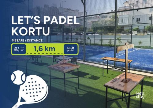 a rendering of a tennis court with tables and benches at Letstay Sweet Home Mint in Antalya