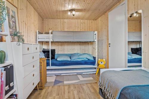 a bedroom with two bunk beds in it at 30189-Malling-Fjordvej-52 in Malling