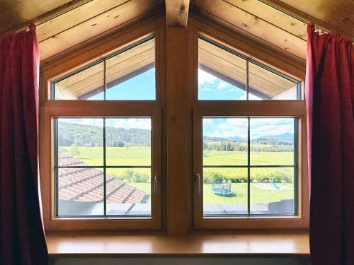 a window in a cabin with a view at Sonnenhof Seeg 15 in Seeg