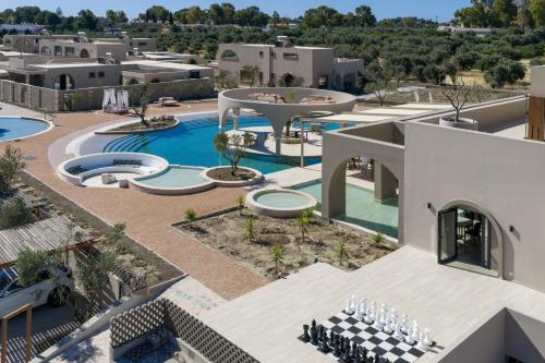 an aerial view of a resort with a swimming pool at The Landmark Villas & Spa in Kolymbia