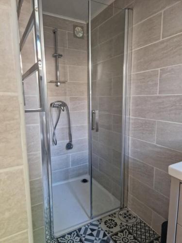 Appartement F1 dans maison individuelle