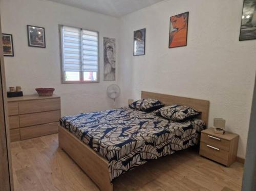 Appartement F1 dans maison individuelle