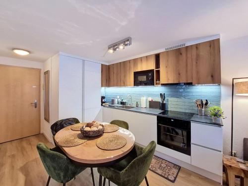Apartment Snowfun B by Interhome