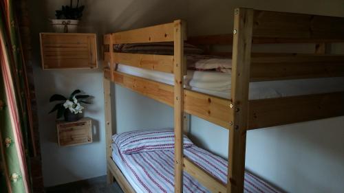 a couple of bunk beds in a room at Cascina Bricco in Ovada