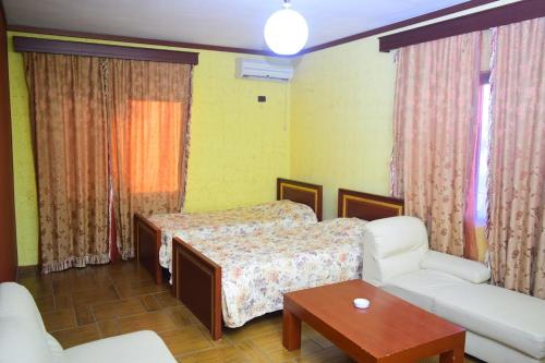 Postel nebo postele na pokoji v ubytování Hotel Deja