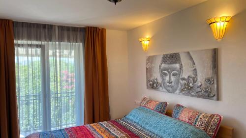 a bedroom with a bed and a window at Villa Rossi in Krk