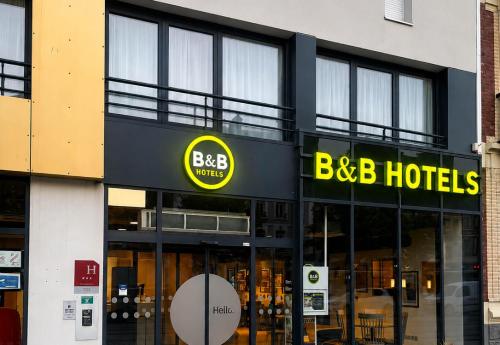 a large building with a bbb hotels sign on it at B&B HOTEL Le Havre Centre in Le Havre
