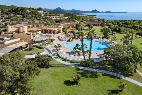 an aerial view of a resort with a swimming pool at Sant'Elmo Beach Hotel in Castiadas