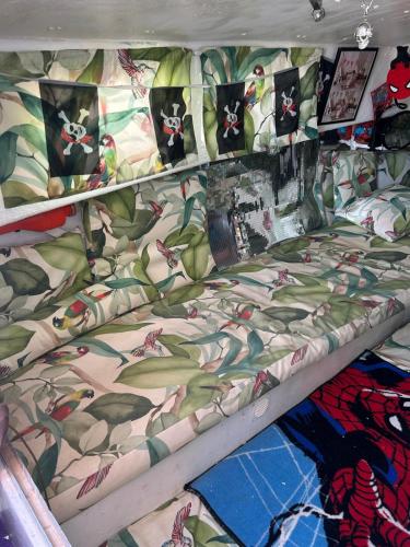 an empty bed in a room with at Jack Sparrow in Puerto de Gandía