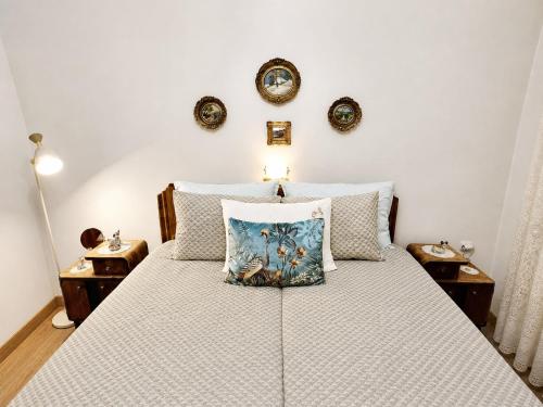 a bedroom with a bed with a pillow on it at Zorica House Vrbas in Vrbas