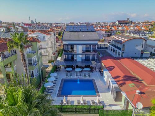 an aerial view of a house with a swimming pool at Blue Serenity Hotel in Side