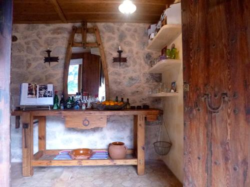 a kitchen with a counter and a sink in a room at Finca Ses Fontanelles in Andratx