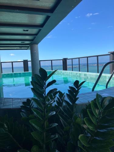 a view of a swimming pool on a cruise ship at Brasil Tropical Luxury Ocean View in Fortaleza
