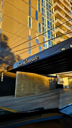 a building with a sign on the side of it at Tigre High View Luxury views in Tigre