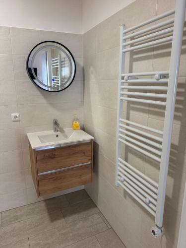 a bathroom with a sink and a mirror at Kaiser von Österreich in Bad Aussee