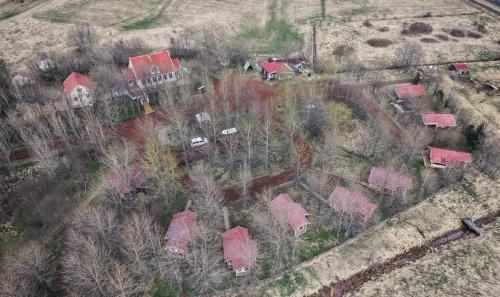 an aerial view of a house with red roofs at Ásgarður Guesthouse in Hvolsvöllur