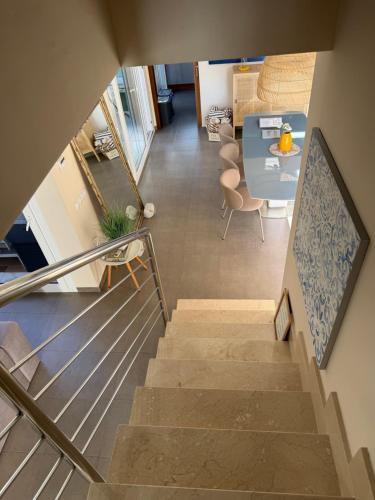 an overhead view of a staircase in a house at Villa Ferrera Select A in Cala Ferrera