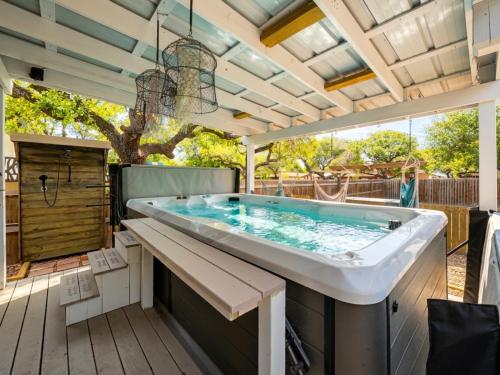 a large bath tub sitting on top of a deck at Ferrymans Landing in Aransas Pass