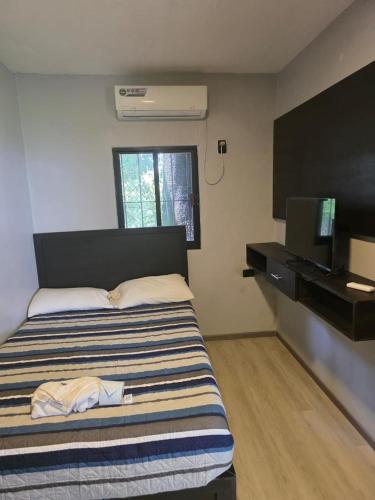 Postel nebo postele na pokoji v ubytování Hotel mg