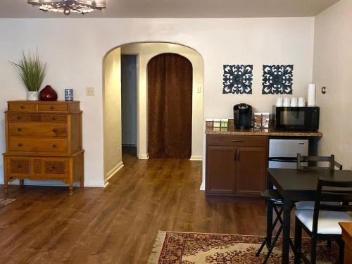 a living room with a dining table and a kitchen at Spacious Private Suite ParksBoatingGolf in San Francisco