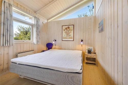 a bedroom with a large bed and a window at 30098-Malling-Norsmindevej-171-K in Malling