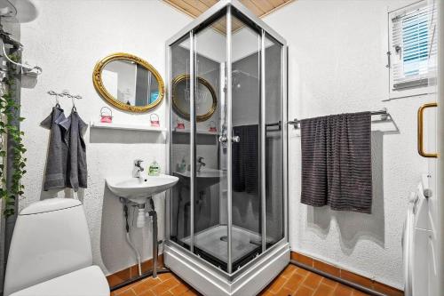 a bathroom with a shower and a sink at C11241-Hemmet-Ildervej-22 in Hemmet