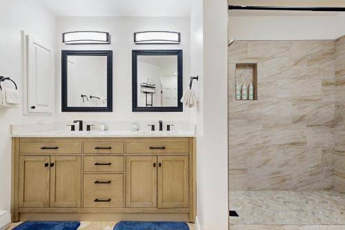 a bathroom with a sink and a shower at Elevation Hideaway in Durango Mountain Resort