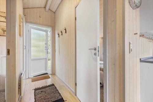 an empty hallway with a door and a window at C11216-Hemmet-Ildervej-5 in Hemmet