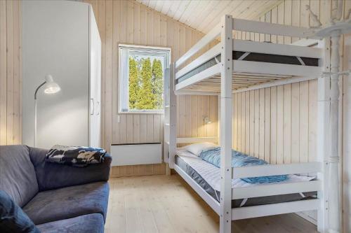 a living room with a bunk bed and a couch at 30042-Malling-Peter-Eriksens-Vej-20 in Malling