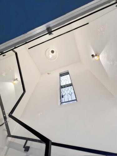a window in the ceiling of a room at Domina Apartment in Kubwa