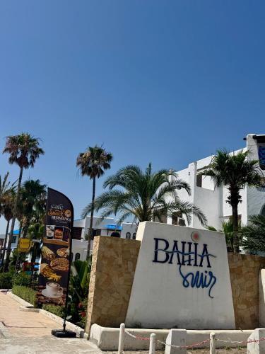 a sign for a barka show in front of a building at Magnifique appartement Bahia Smir Fnideq Mdiq nord in Fnidek